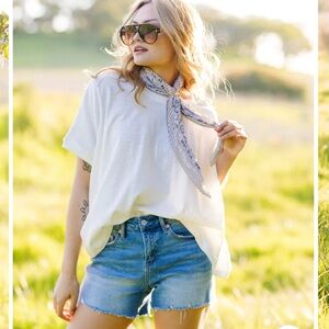 LOFT Fresh Cut High Rise Cut Off Denim Shorts in Classic Light Denim.